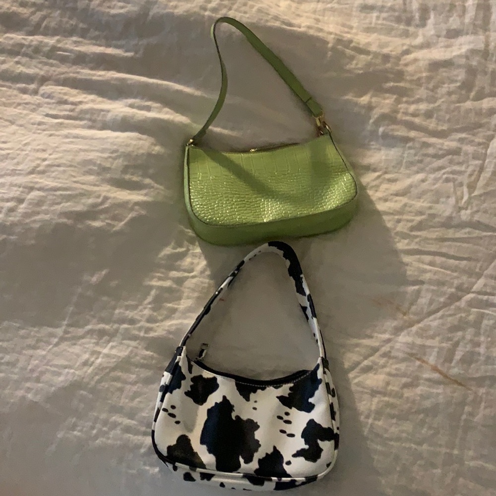 Green and cow print purses